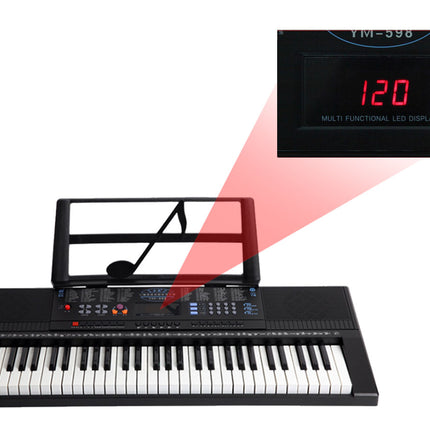 Keyboard with music stand and digital display showing '120'.