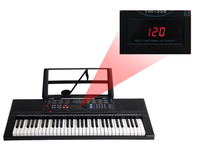 Keyboard with music stand and digital display showing '120'.