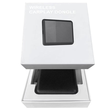 Wireless CarPlay Dongle in a white box on a white background