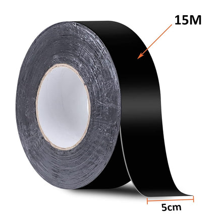 Roll of black tape with measurements on a white background