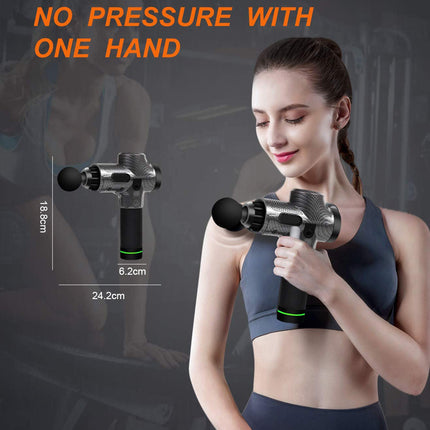 A woman in athletic wear holds a handheld massage gun in front of a gym background, with orange text reading 'NO PRESSURE WITH ONE HAND' and dimension labels showing 18 cm height, 6.2 cm width, and 24.