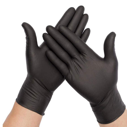 Pair of black gloves held together on a white background