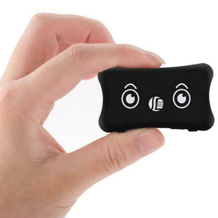 A hand holding a small black rectangular electronic device with white printed icons on a plain white background.