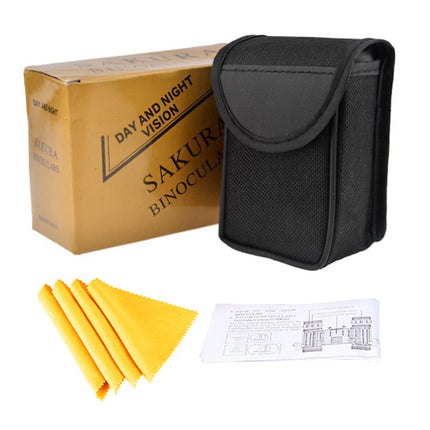 Binoculars with carrying case, cleaning cloth, and instruction sheet on a white background