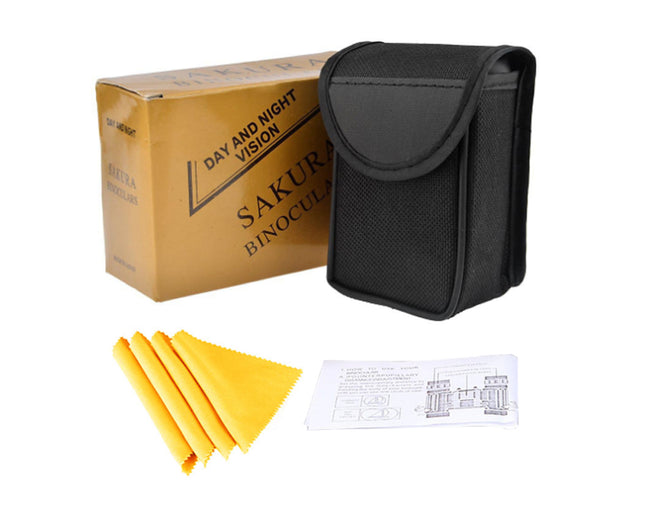 Binoculars with carrying case, cleaning cloth, and instruction sheet on a white background