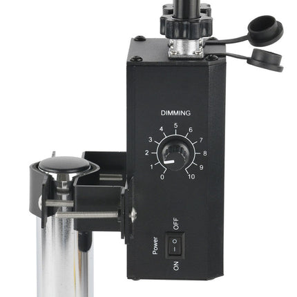 Black dimming control panel with a dial and power switch on a white background