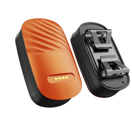 Orange and black electronic device on a white background