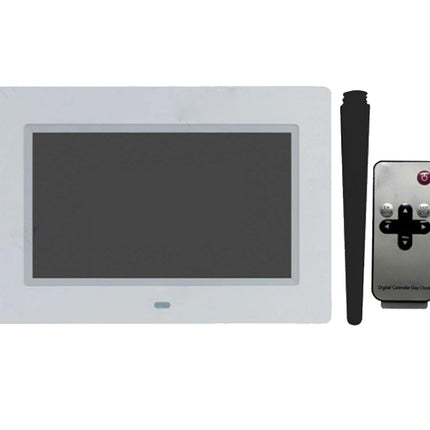 A digital console display with a white bezel and dark screen, shown alongside a black antenna and a silver remote control on a plain white background.