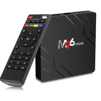 M96 mini TV box with remote control on a white background