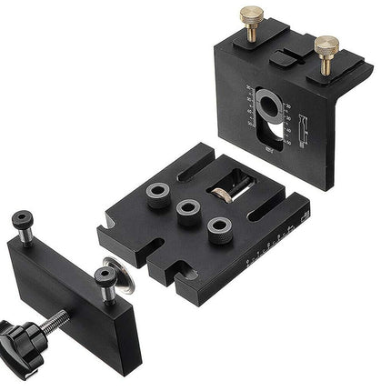 Set of black metal clamps on a white background