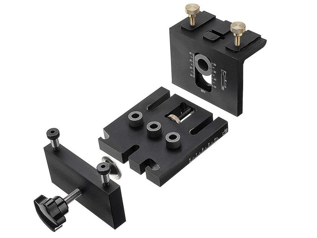Set of black metal clamps on a white background