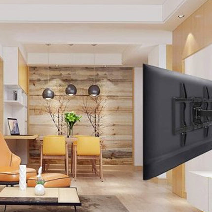 Modern living room with a TV mounted on the wall, dining area in the background