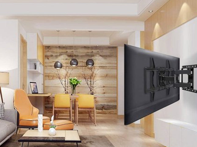 Modern living room with a TV mounted on the wall, dining area in the background
