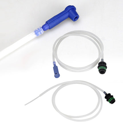 Medical tubing set with a blue angled connector, clear flexible tubes, and black and green end caps on a white background.