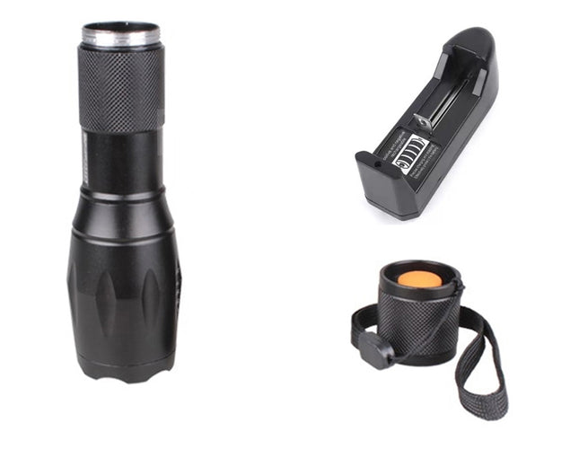 Black flashlight with battery pack and holder on a white background