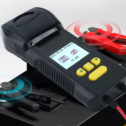 Black battery charger with digital display and red clamps on a white background