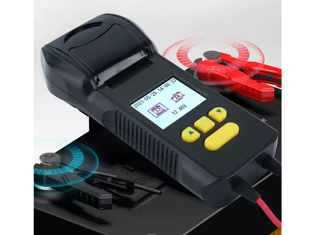 Black battery charger with digital display and red clamps on a white background