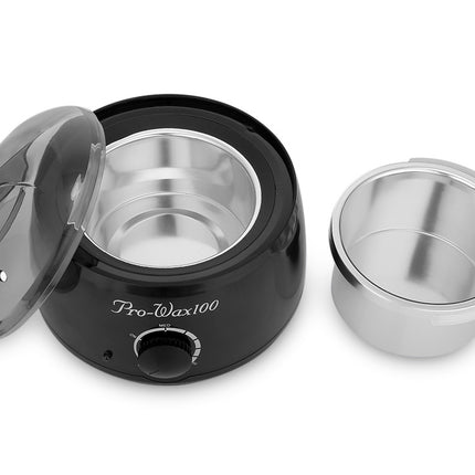 Black wax warmer with a silver container on a white background