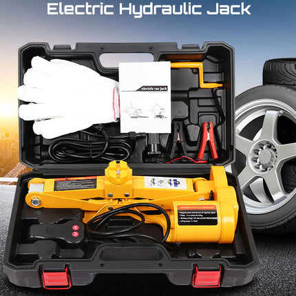 Electric hydraulic jack in a carrying case with a car tire in the background