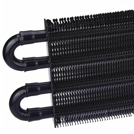 Close-up of a black metal heat exchanger on a white background