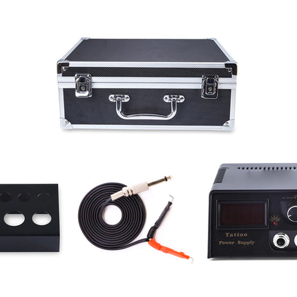 Tattoo power supply with accessories on a white background