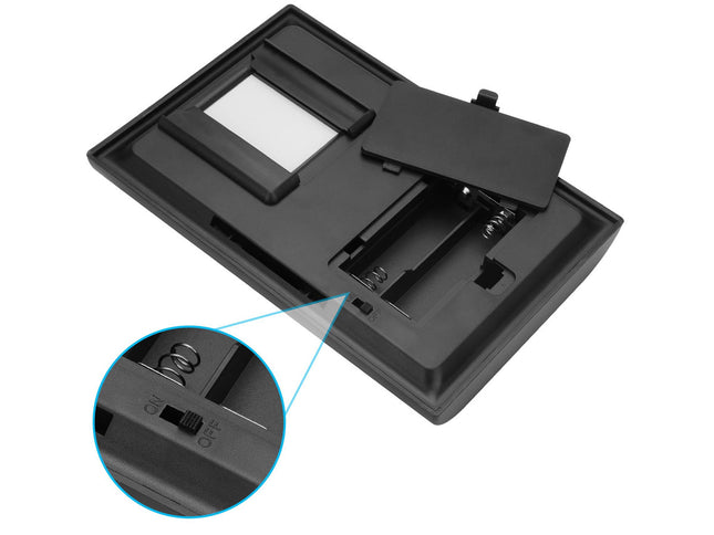 Black electronic device with a close-up detail on a white background