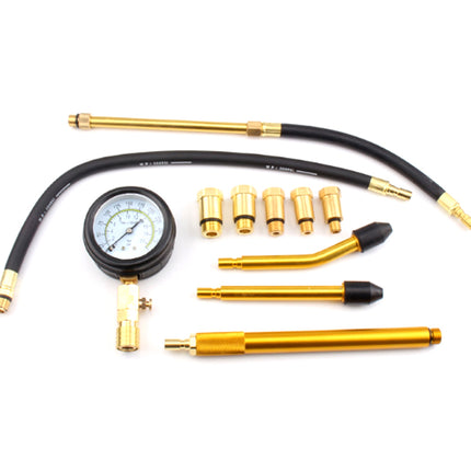 Set of automotive diagnostic tools with hoses and gauge on a white background