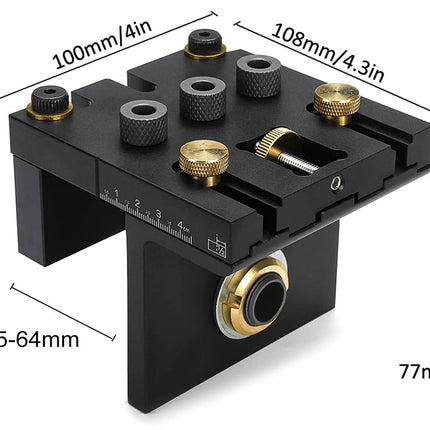 Black metal tool with gold accents and measurements on a white background