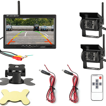 Car reverse camera system with monitor, cameras, cables, and remote control on a white background