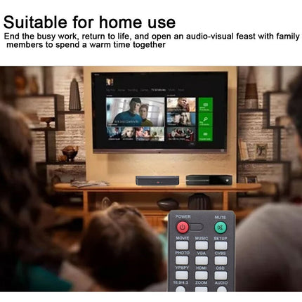 Family watching television in a living room with a remote control in the foreground.