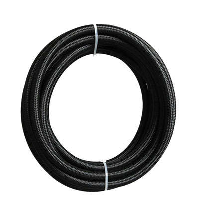 Coiled black hose on a white background