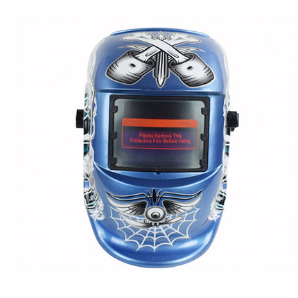 Blue welding helmet with spider web design on a white background