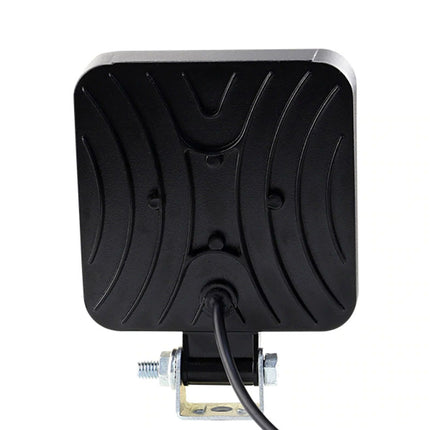 Black rectangular antenna with a cable on a white background