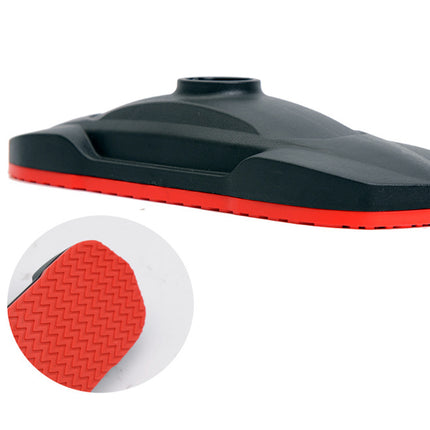 Black and red rubber bung on a white background with close-up of texture.