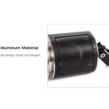 A close-up of a black cylindrical metal container or accessory with a perforated mesh body, ribbed edges, and a small attached black strap, shown on a white background with text reading 'Metal Aluminum Material' and 'Stripe non-slip design, stylish and elegant.'.