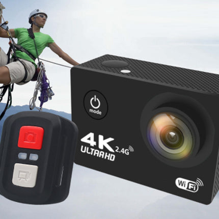 Action camera with remote control on a mountain climbing background