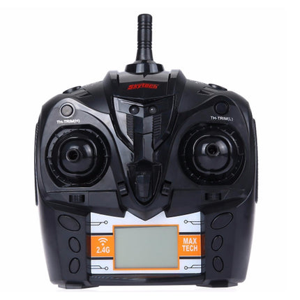 Black remote control with digital display on a white background