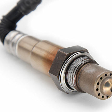 Metal sensor with a cable on a white background