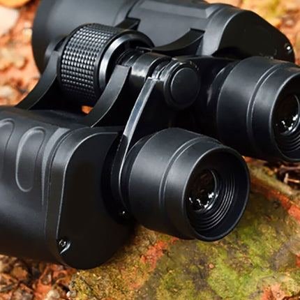 Black binoculars on a natural background