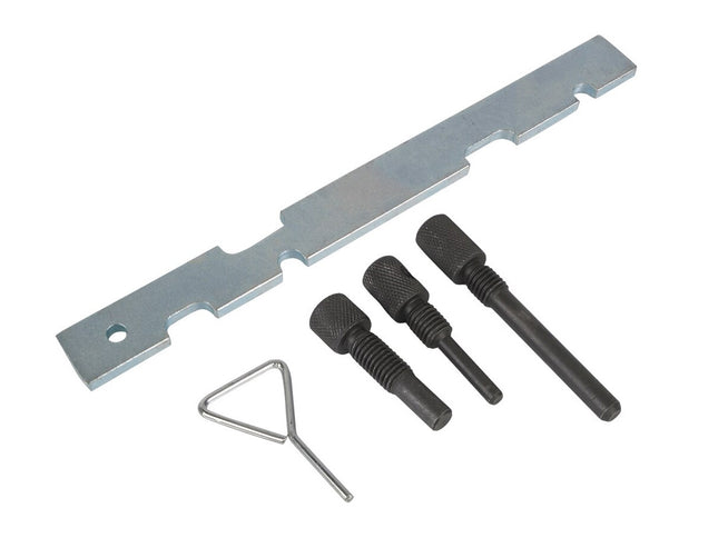 Set of metal tools including a large flat metal bar, three black cylindrical tools, and a small silver triangular tool on a white background.