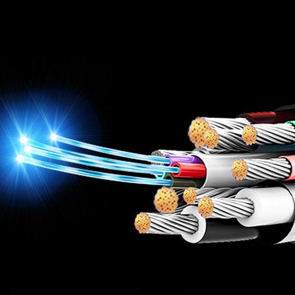 Cross-section of a fiber optic cable with illuminated fibers on a dark background