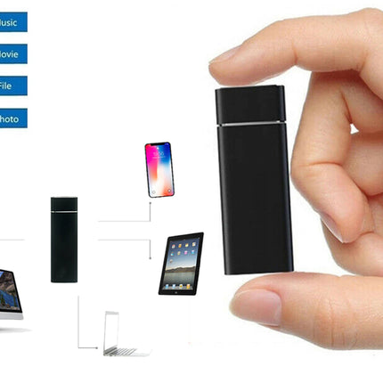 Hand holding a small black device with icons and devices displayed on a white background