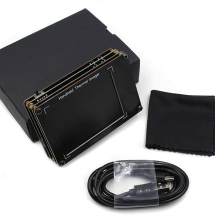 Handheld thermal imager with accessories on a white background