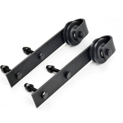Black metal bracket with wheels on a white background