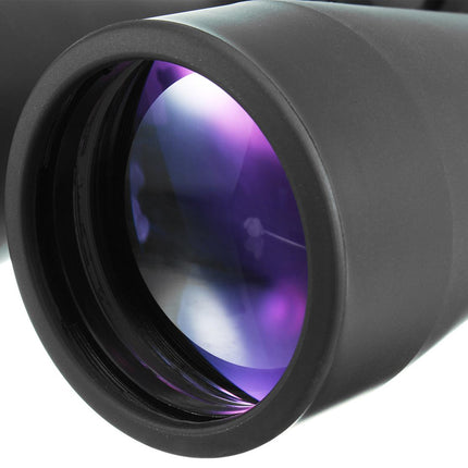 Close-up of a black telescope lens with purple interior on a white background