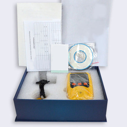 Yellow device in a box with a white interior, on a light gray background