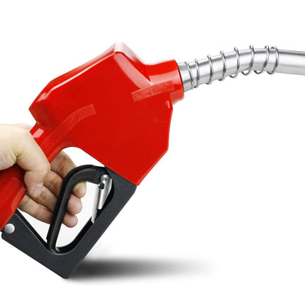 Red fuel pump nozzle held by a hand on a white background