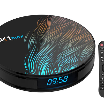 A black round HIK1max streaming receiver device with a digital display showing 09:58 and an abstract blue and orange wave pattern on the top, shown alongside a matching black remote control on a white background.