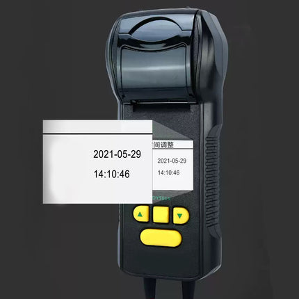 Handheld device with a display showing date and time on a dark background