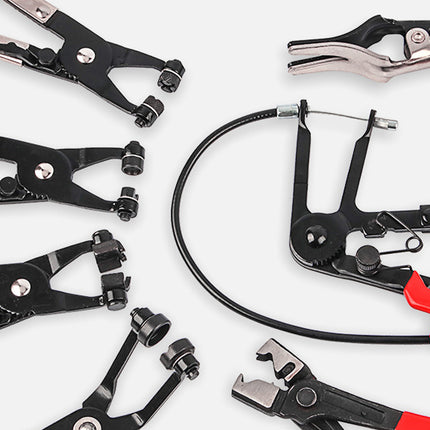 A set of black and red wire stripping and crimping tools arranged on a clean white background.